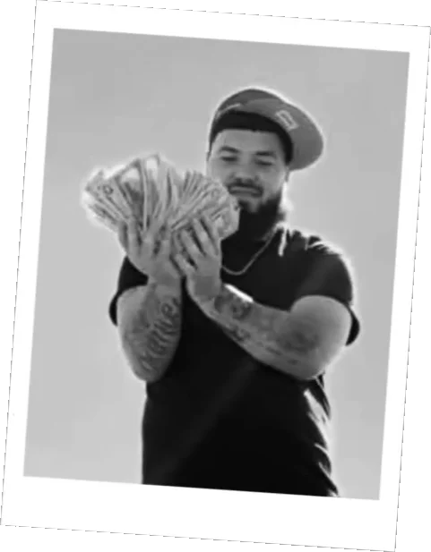Jackson holding a fan of cash